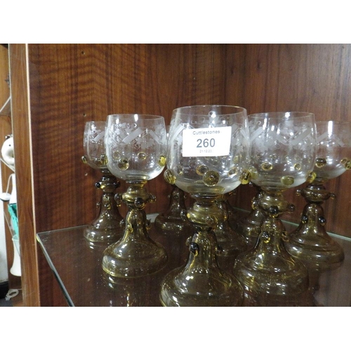 260 - A SET OF NINE VINTAGE ETCHED GLASS GOBLETS