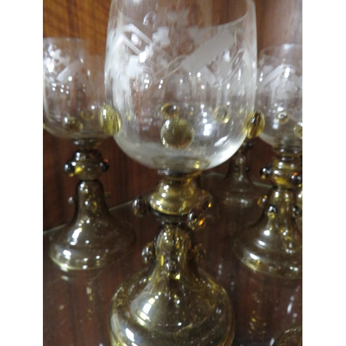 260 - A SET OF NINE VINTAGE ETCHED GLASS GOBLETS