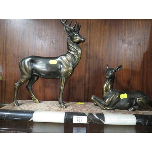 261 - TWO BRONZE EFFECT DEER ON A MARBLE TYPE PLINTH A/F