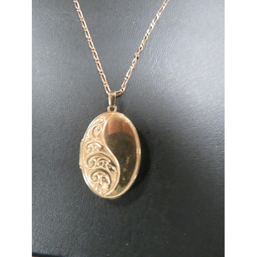 468 - A HALLMARKED 9CT GOLD CHAIN WITH UNMARKED YELLOW METAL LOCKET approx weight chain only 2.8g