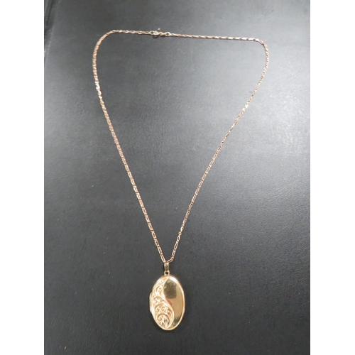 468 - A HALLMARKED 9CT GOLD CHAIN WITH UNMARKED YELLOW METAL LOCKET approx weight chain only 2.8g