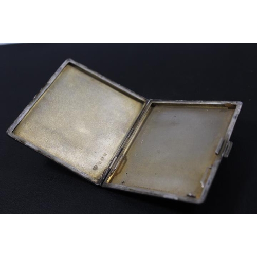 502 - A HALLMARKED SILVER CARD CASE