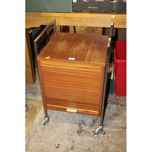 870 - A RETRO TEAK AND CHROME FILING CABINET ON CASTORS