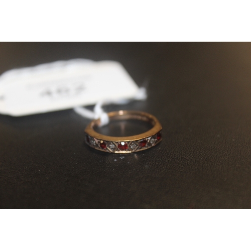 462 - A HALLMARKED 9 CARAT GOLD GEM SET HALF ETERNITY RING  SET WITH RUBY AND DIAMOND STYLE STONES approx ... 