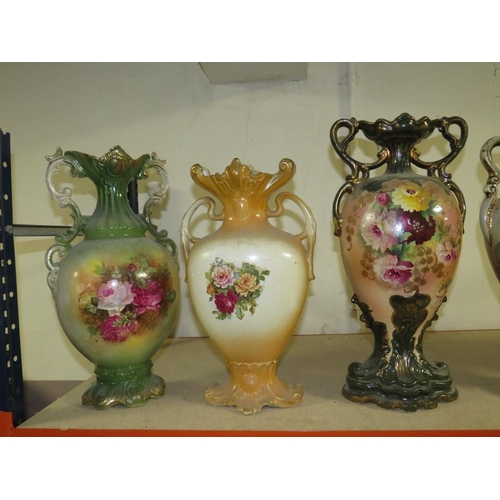 184 - A  COLLECTION OF DECORATIVE TWIN HANDLE VASES (7)