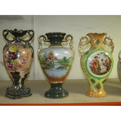 184 - A  COLLECTION OF DECORATIVE TWIN HANDLE VASES (7)