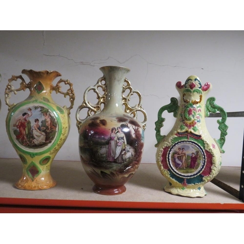 184 - A  COLLECTION OF DECORATIVE TWIN HANDLE VASES (7)