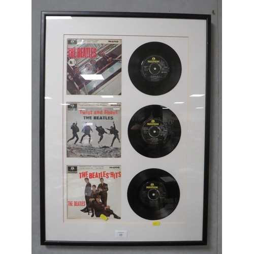 28 - A FRAMED BEATLES 45 SINGLES SET 61 X 40 CM