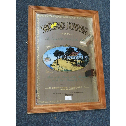 36 - A SOUTHERN COMFORT ADVERTISING MIRROR - OVERALL 64 X 46 CM