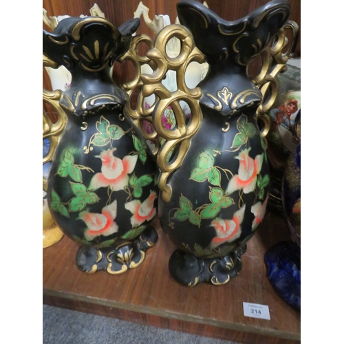 214 - A  COLLECTION OF DECORATIVE VASES , TWIN HANDLE VASES TO INCLUDE A TWIN HANDLE URN ON A PEDESTAL STA... 