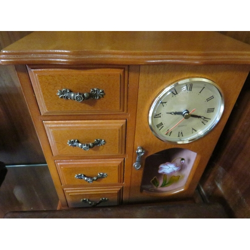 222 - A WOODEN MONEY BANK DATED 1881 TOGETHER WITH TWO WOODEN / JEWELLERY BOXES AND A MIRRORED TRAY (4)