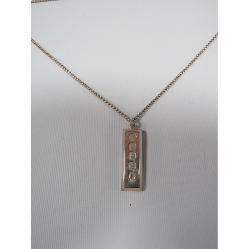 311 - A MENS VINTAGE 1 oz SILVER INGOT ON A SILVER CHAIN