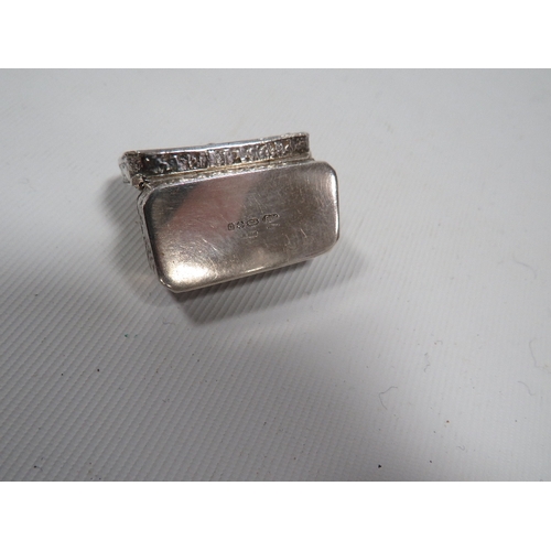 336 - A MODERN CONTINENTAL STYLE SILVER PILL BOX, with import hallmarks, decorated with typical neoclassic... 