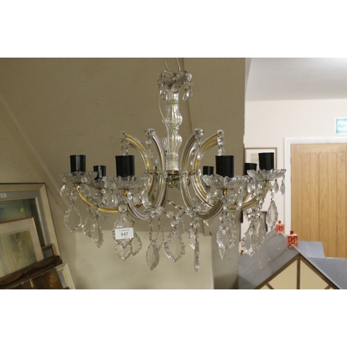 847 - AN EIGHT BRANCH CRYSTAL CHANDELIER TOGETHER WITH MATCHING WALL LIGHTS