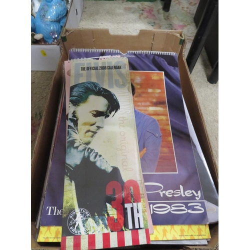 126 - A COLLECTION OF TWENTY FOUR ASSORTED ELVIS PRESLEY CALENDARS FROM 1983 TO 2020