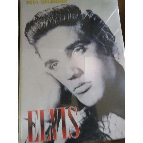 126 - A COLLECTION OF TWENTY FOUR ASSORTED ELVIS PRESLEY CALENDARS FROM 1983 TO 2020