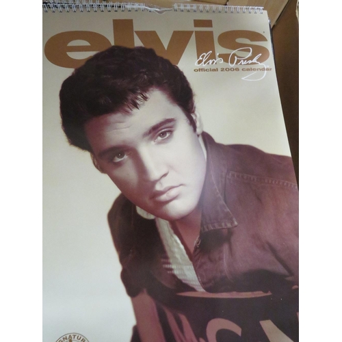 126 - A COLLECTION OF TWENTY FOUR ASSORTED ELVIS PRESLEY CALENDARS FROM 1983 TO 2020