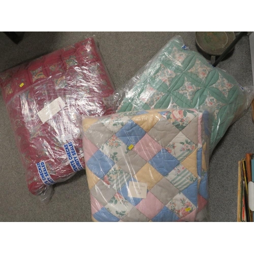 148 - A SELECTION OF HAND SEWN QUILTS