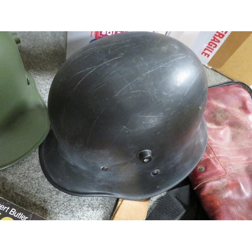 156 - A QUANTITY OF REPRODUCTION MILITARY HELMETS TOGETHER WITH A QUANTITY OF MILITARY BOOKS