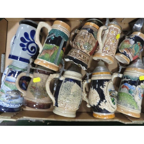 186 - A LARGE COLLECTION OF ASSORTED BEER STEINS OVER FOUR TRAYS