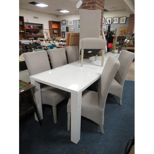 752 - A MODERN WHITE GLOSS DINING TABLE WITH SIX UPHOLSTERED CHAIRS