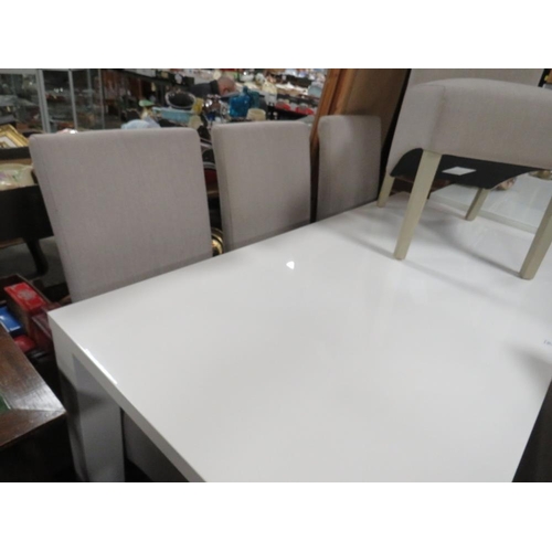 752 - A MODERN WHITE GLOSS DINING TABLE WITH SIX UPHOLSTERED CHAIRS