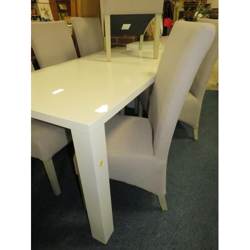 752 - A MODERN WHITE GLOSS DINING TABLE WITH SIX UPHOLSTERED CHAIRS