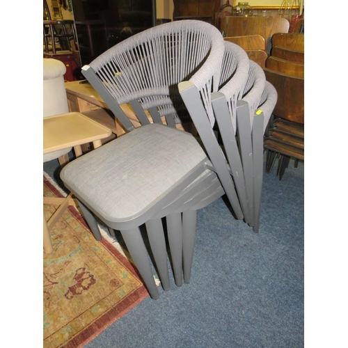 774 - FOUR MODERN STACKING PATIO CHAIRS