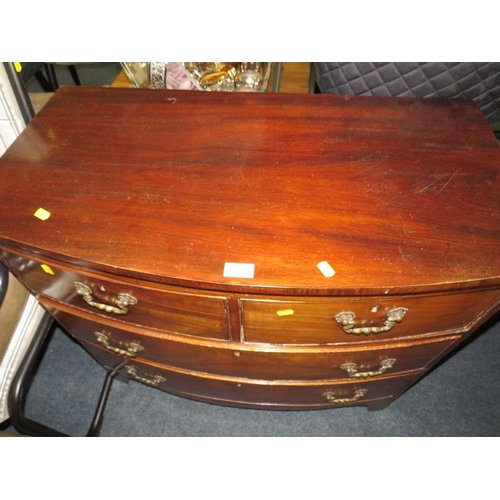 792 - AN ANTIQUE MAHOGANY BOW FRONTED FOUR DRAWER CHEST - W 88 cm