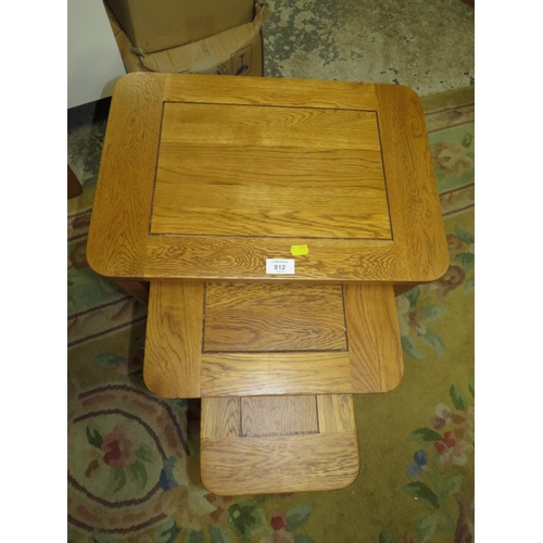 812 - A MODERN OAK NEST OF TABLES