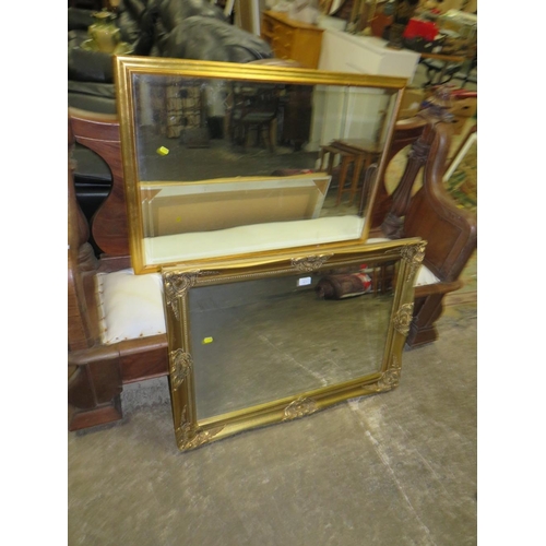 818 - TWO MODERN GILT FRAMED RECTANGULAR MIRRORS