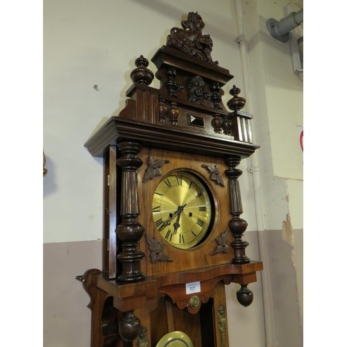 821 - AN EDWARDIAN WALNUT WALL CLOCK