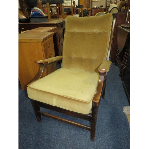 824 - A MID COUNTRY UPHOLSTERED ARMCHAIR