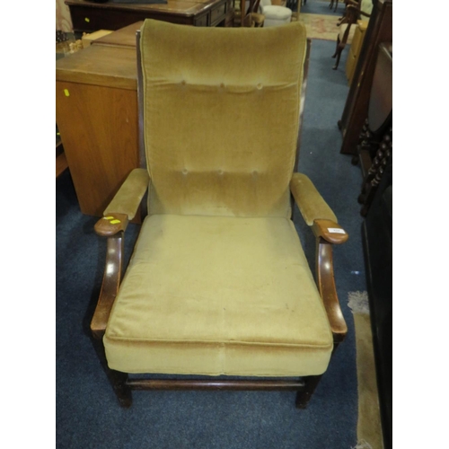 824 - A MID COUNTRY UPHOLSTERED ARMCHAIR