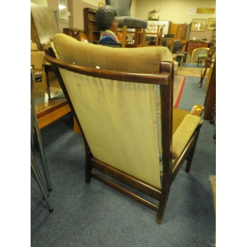 824 - A MID COUNTRY UPHOLSTERED ARMCHAIR