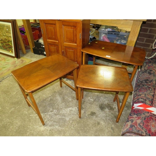 828 - A RETRO NEST OF TABLES & A TWO DOOR CABINET