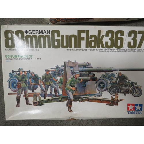 208 - FOUR TAMIYA MILITARY MODEL KITS TO INCLUDE 88mm GUN FLAK36/37, Mt15SPW HALF TRACK AND US 2.5 TON 6x6... 