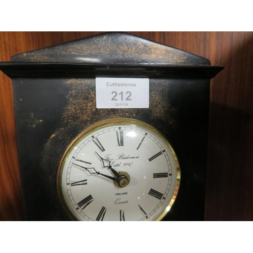 212 - A DECORATIVE QUARTZ MANTLE CLOCK