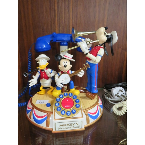 216 - A VINTAGE DISNEY MICKEY'S DIXIE LAND BAND AUTOMATON MUSICAL TELEPHONE TOGETHER WITH A VINTAGE BELL R... 