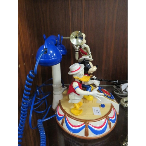 216 - A VINTAGE DISNEY MICKEY'S DIXIE LAND BAND AUTOMATON MUSICAL TELEPHONE TOGETHER WITH A VINTAGE BELL R... 