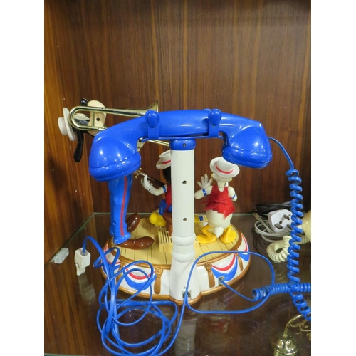 216 - A VINTAGE DISNEY MICKEY'S DIXIE LAND BAND AUTOMATON MUSICAL TELEPHONE TOGETHER WITH A VINTAGE BELL R... 