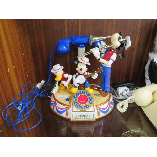 216 - A VINTAGE DISNEY MICKEY'S DIXIE LAND BAND AUTOMATON MUSICAL TELEPHONE TOGETHER WITH A VINTAGE BELL R... 