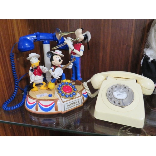 216 - A VINTAGE DISNEY MICKEY'S DIXIE LAND BAND AUTOMATON MUSICAL TELEPHONE TOGETHER WITH A VINTAGE BELL R... 