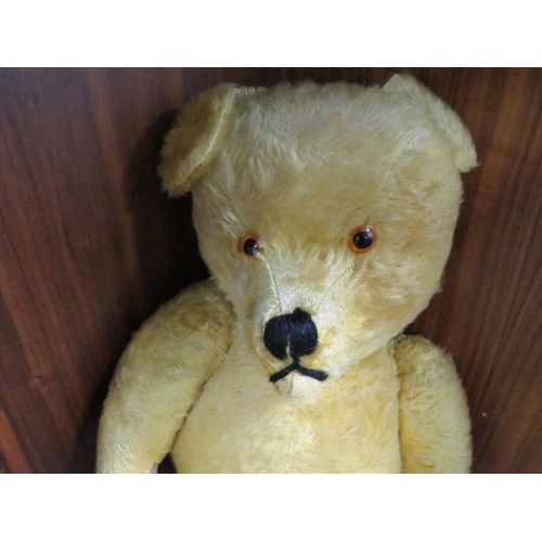 217 - A VINTAGE MOHAIR JOINTED BEAR APPROX HEIGHT 60CM VENDOR ADVISES ORIGINAL HAND  MADE BY A LADY WHO WO... 