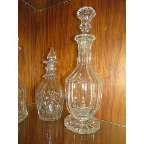 246 - A COLLECTION OF GEORGIAN CUT GLASS DECANTERS