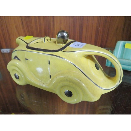 248 - A VINTAGE SADLER RACING CAR TEAPOT IN YELLOW, TOGETHER WITH TWO SIMILAR STYLE SOFAS (3)