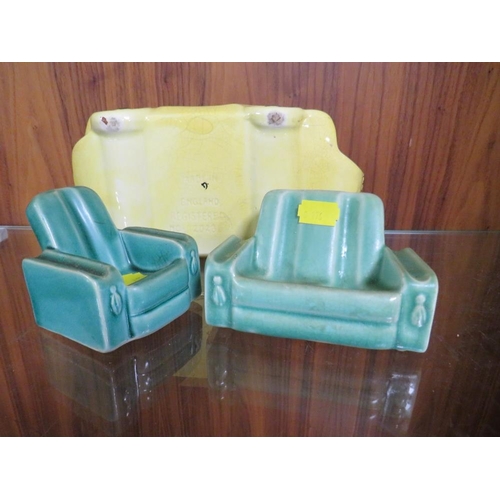 248 - A VINTAGE SADLER RACING CAR TEAPOT IN YELLOW, TOGETHER WITH TWO SIMILAR STYLE SOFAS (3)