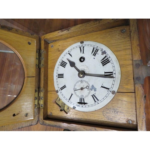 250 - A VINTAGE CASED PIGEON CLOCK