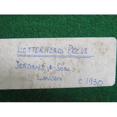 253 - A CAST IRON PAPER STAMP FOR IRELANDS GARAGE LIMITED