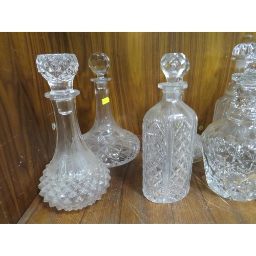 255 - A COLLECTION OF MODERN AND ANTIQUE DECANTERS (12)